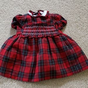 Red and black plaid dress with smocking detail